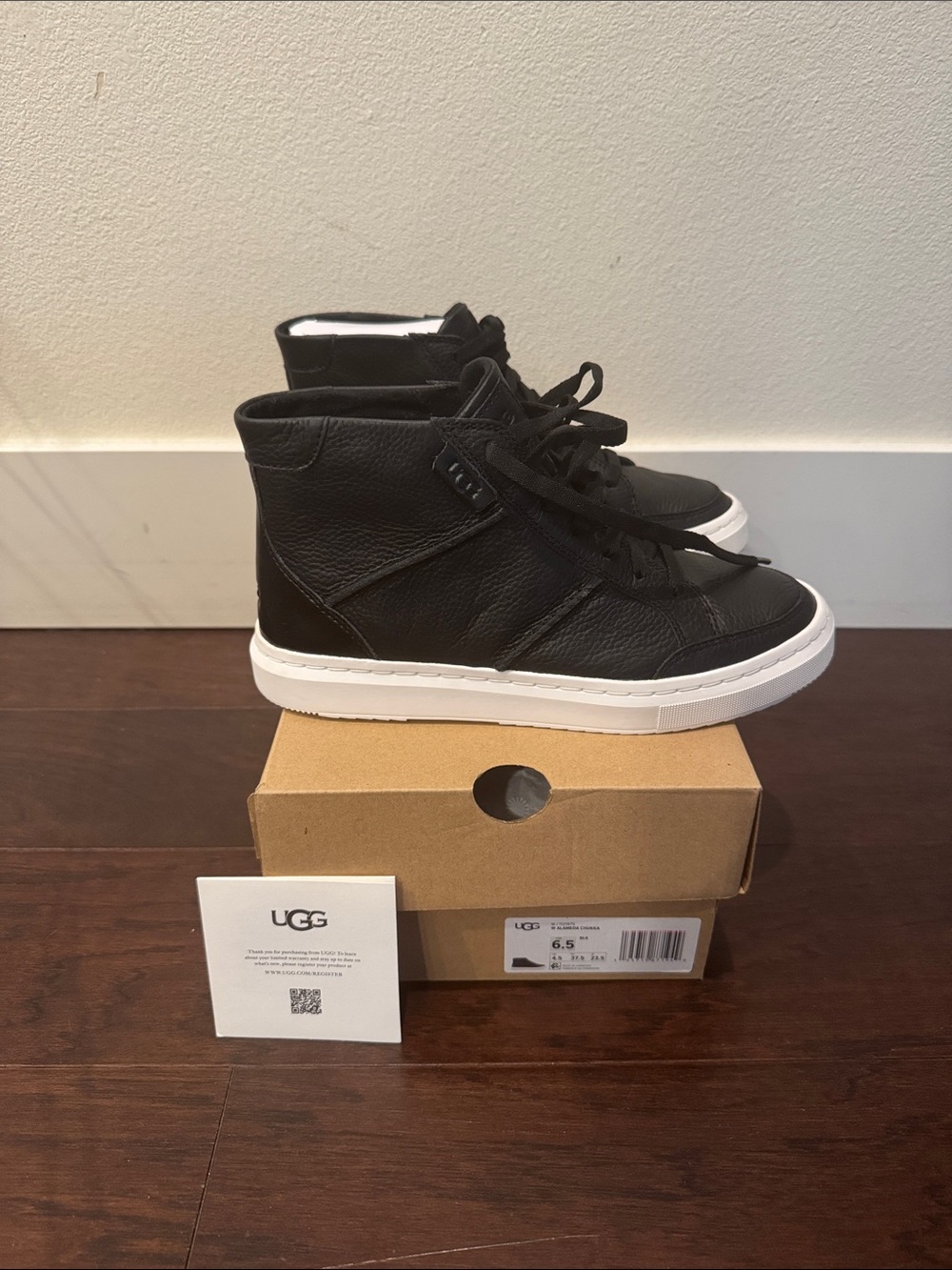 UGG Black Leather High-Top Sneakers with White Sole